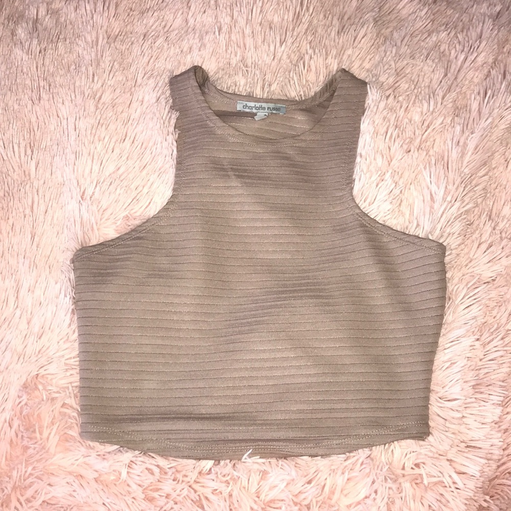 Crop top, high neck razor style.